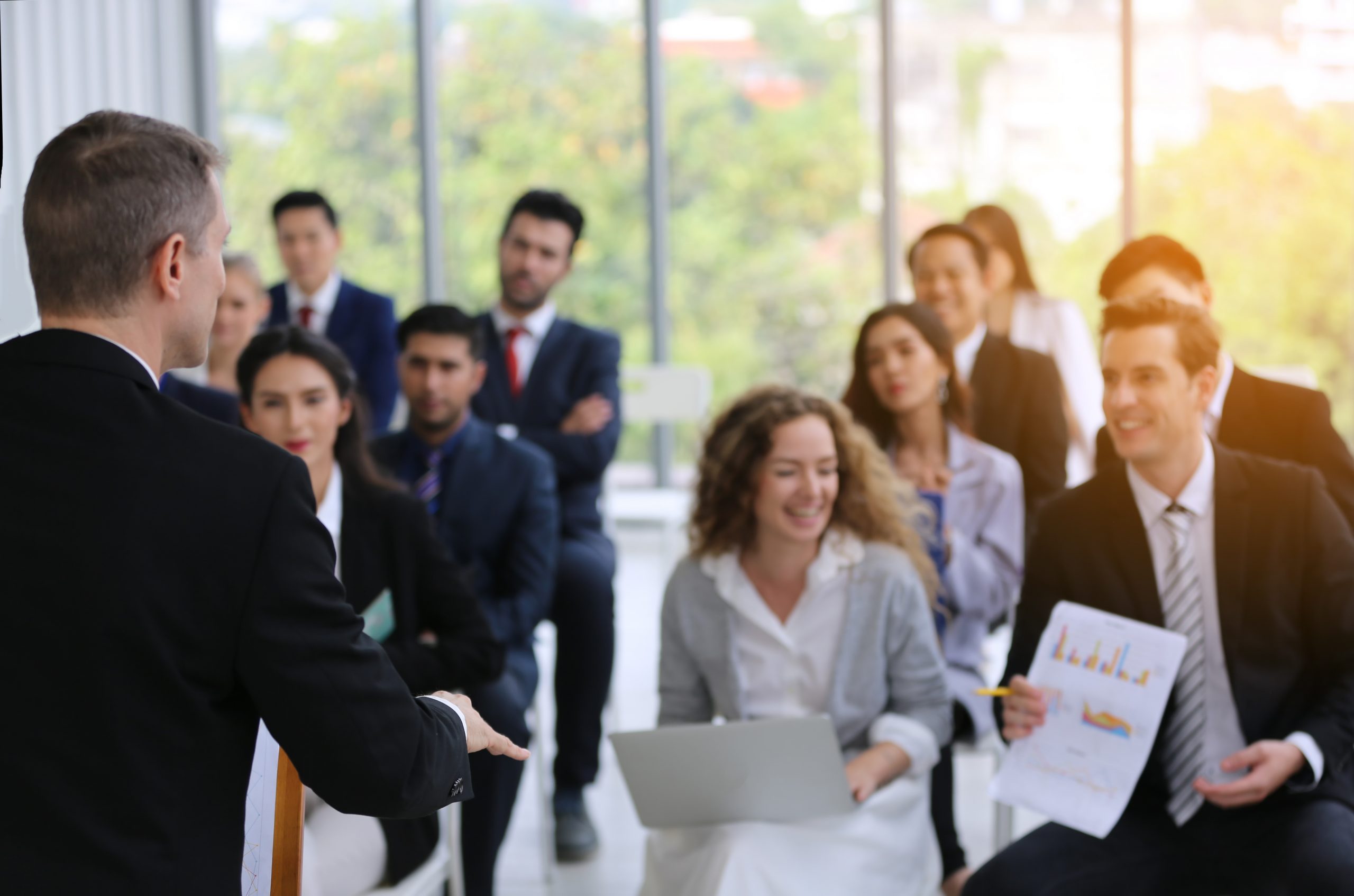 A group of people at a corporate training seminar